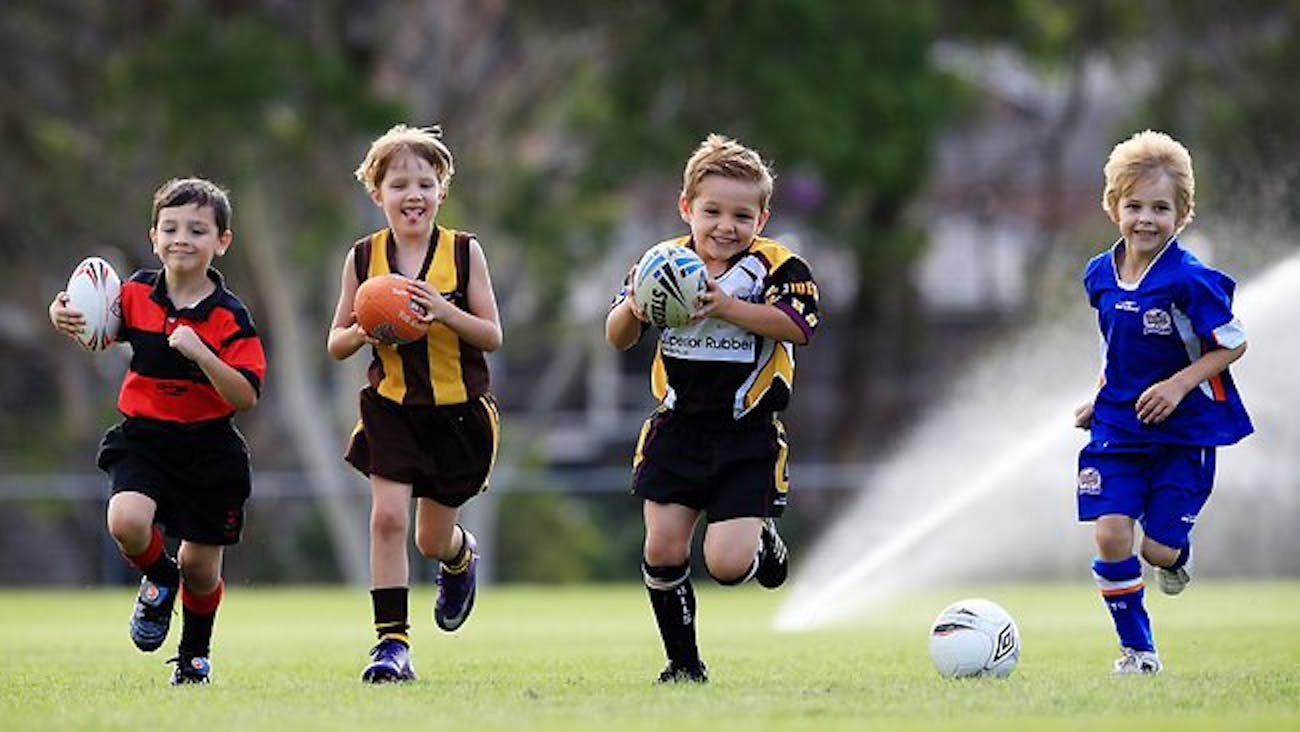 https://flipgive.imgix.net/images/stories/photos/000/000/077/original/248917-children-playing-footy.jpg?ch=Width%2CDPR%2CSave-Data&auto=format%2Ccompress&dpr=2